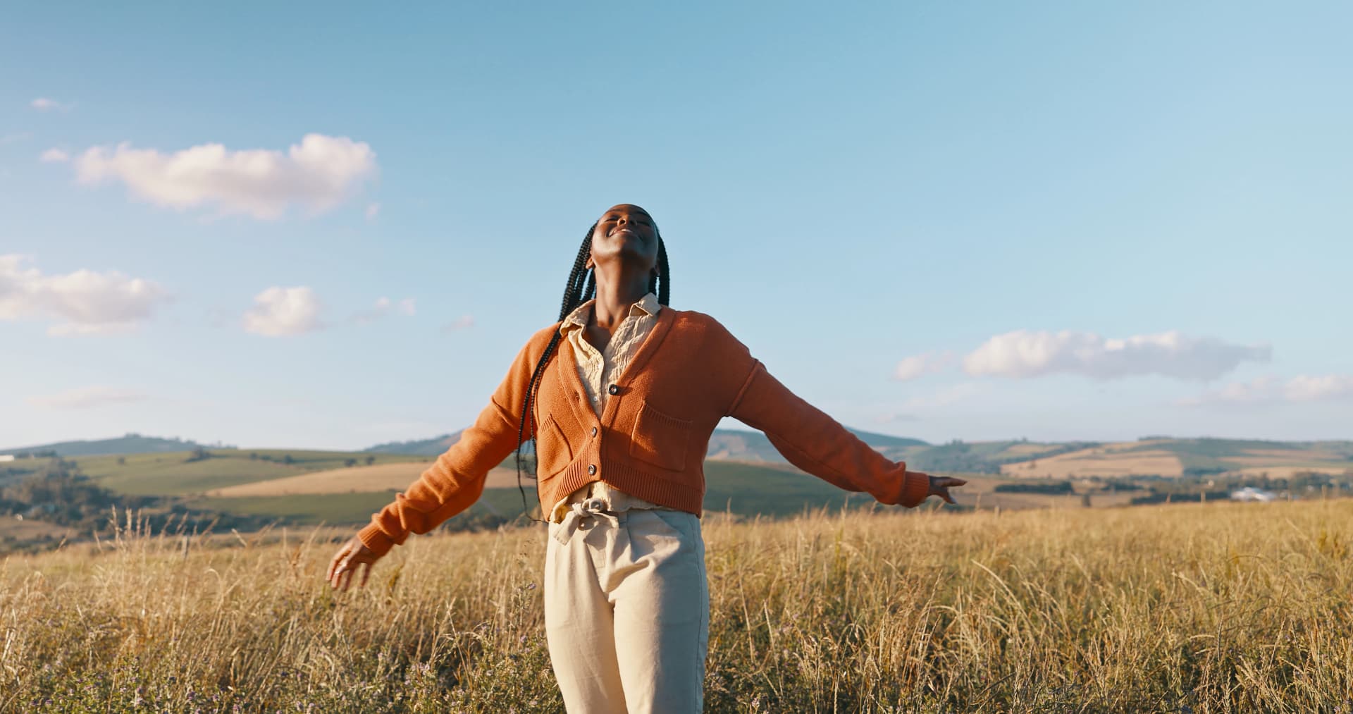 Woman in a field, representing a life well lived